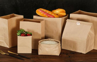 ¿Qué equipo es el más adecuado para la producción de máquinas de bolsas de papel?